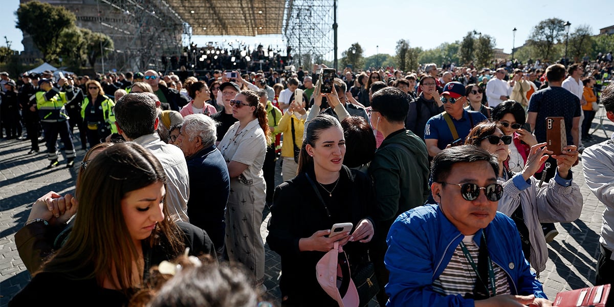 People gather on the day of the funeral for Pope Francis, in Rome, Italy, April 26, 2025. — Reuters