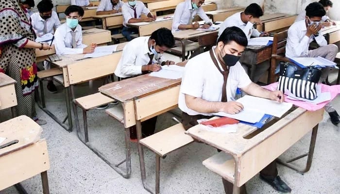 A representational image of students appearing in an exam. — APP/File