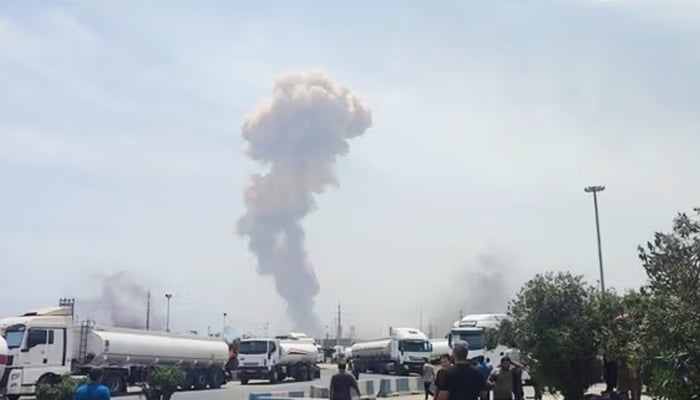 Smoke erupts from the site of the blast in southern Iranian city of Bandar Abbas, on April 26, 2025. — Iranian media