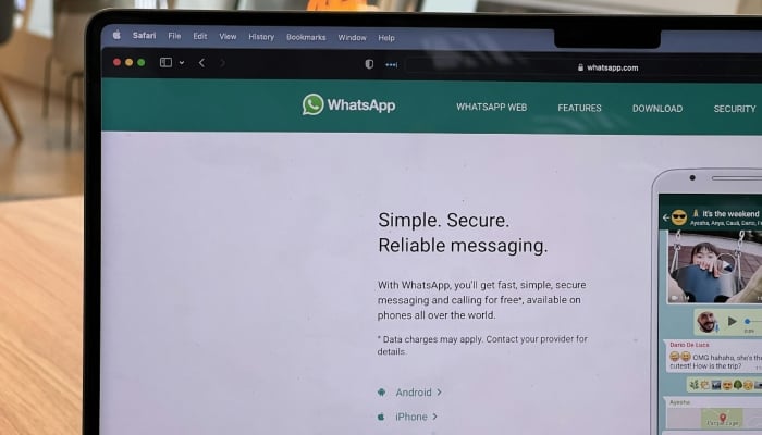 This representational image shows the WhatsApp Web homepage displayed on a computer screen. — Unsplash
