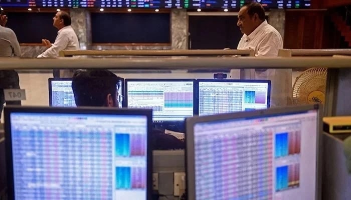 A stockbroker looks at a computer during a trading session at the Pakistan Stock Exchange (PSX) in Karachi on July 31, 2023. — AFP