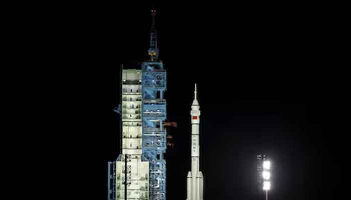 A Long March-2F rocket carrying the Shenzhou-19 spacecraft sits at the launch pad before taking off from the Jiuquan Satellite Launch Centre for a crewed mission to Chinas Tiangong space station, near Jiuquan, Gansu province, China, October 30, 2024. — Reuters