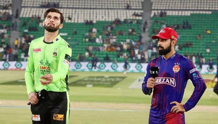 Lahore Qalandars Shaheen Shah Afridi (left) flips the coin as Islamabad Uniteds Shadab Khan looks on during the toss for their PSL 10 match at the Gaddafi Stadium in Lahore on April 30, 2025. — PCB