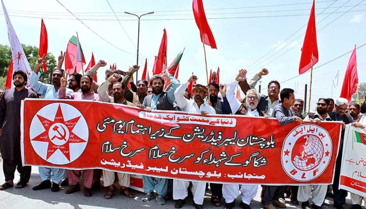 Trade union leaders and workers participate in a rally in Balochistan. — APP