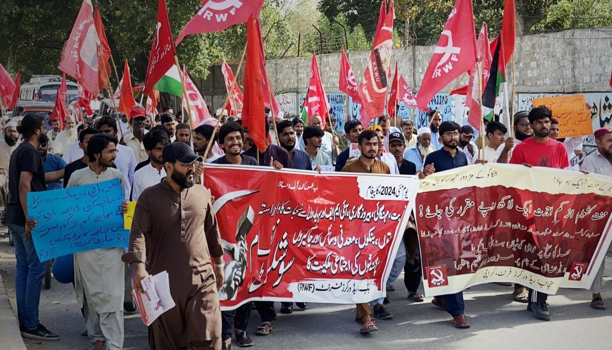Members of the Red Workers Front participate in a rally. — Red Workers Front