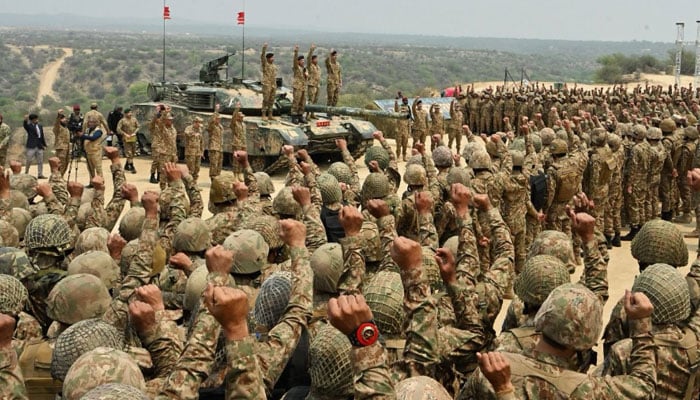 Chief of Army Staff General Asim Munir joins troops as they raise slogans during his visit to Tilla Field Firing Ranges on May 1, 2025. — ISPR