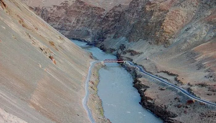 An undated image of Indus River flowing between the mountainous terrain. — Reuters