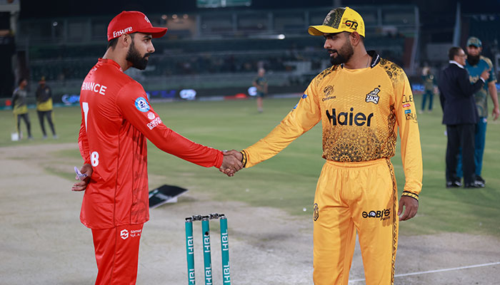 Islamabad United captain Shadab Khan and Peshawar Zalmi skipper Babar Azam at toss ceremony during their match in Pakistan Super League (PSL) at Rawalpindi Cricket Stadium, April 14, 2025. — PCB