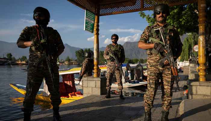 Indian personnel stand guard on the banks of Dal Lake, in Srinagar April 25, 2025. — Reuters