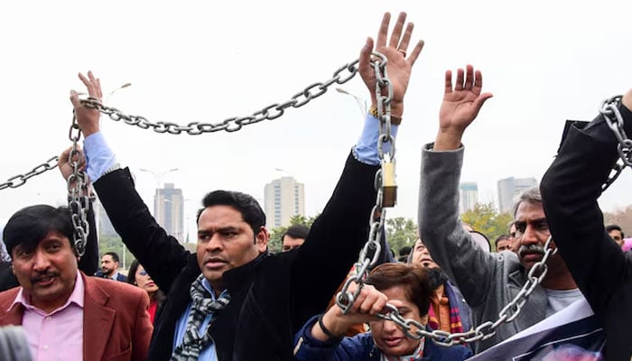 Journalists rally against what they call, curbing press freedom and controlling the digital landscape, during a protest in Islamabad on January 28, 2025. — Reuters