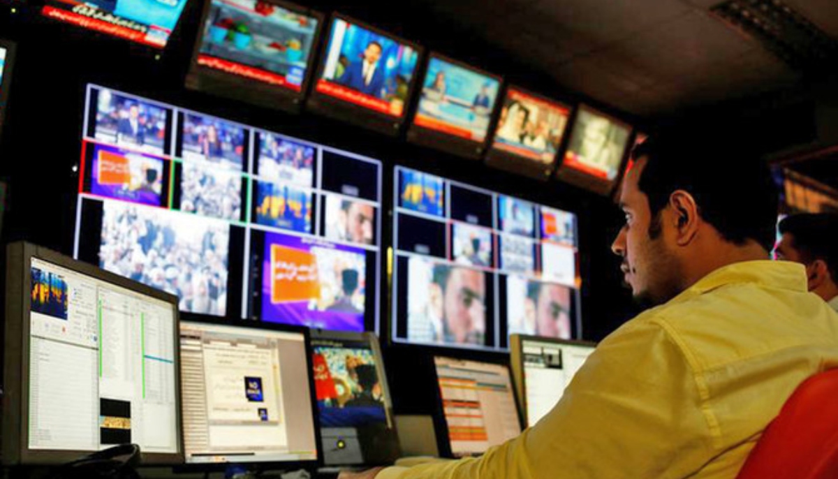 An employee works at the control room of a television channel in Karachi on April 11, 2018. — Reuters