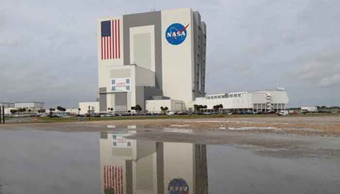 The massive Vehicle Assembly Building where Nasa’s powerful new 322-foot-tall moon rocket has been assembled for the unpiloted Artemis 1 mission, is reflected after a hard rain at the Kennedy Space Centre in Cape Canaveral, Florida, US October 28, 2021. — Reuters