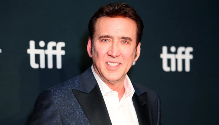 Nicolas Cage laughs over paparazzi coverage of him surfing for The Surfer