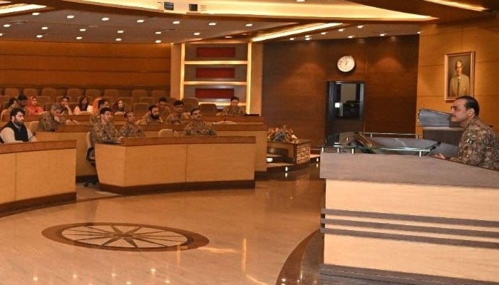 Chief of Army Staff (COAS) General Asim Munir (right) addresses participants of the 15th National Workshop Balochistan at GHQ on May 5, 2025. — ISPR