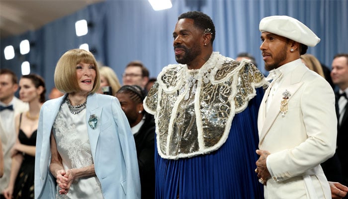 Anna Wintour, Colman Domingo, and Lewis Hamilton/ REUTERS/Mario Anzuoni