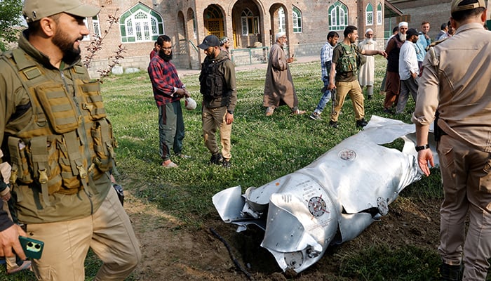 Metal debris lies on the ground in Wuyan in India Illegally Occupied Jammu and Kashmirs Pulwama district May 7, 2025. — Reuters