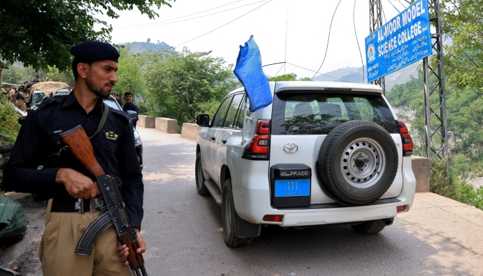 A police officer stands guard as a team of UN arrives to visit the Bilal Mosque after it was hit by an Indian strike in Muzaffarabad, the capital of Azad Jammu and Kashmir, on May 7, 2025. —Reuters