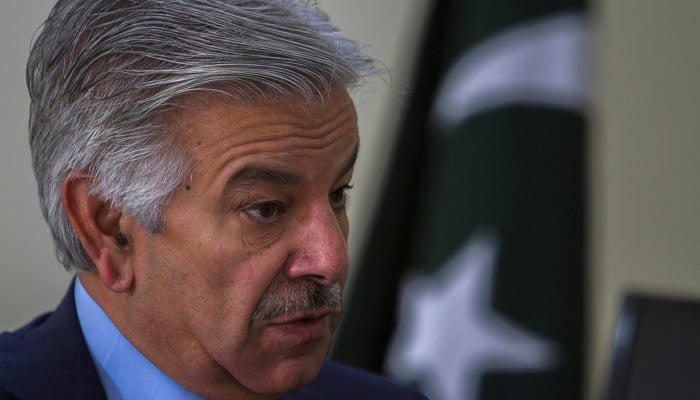 Defence Minister Khawaja Asif speaks during an interview with Reuters at his office in Islamabad. — Reuters