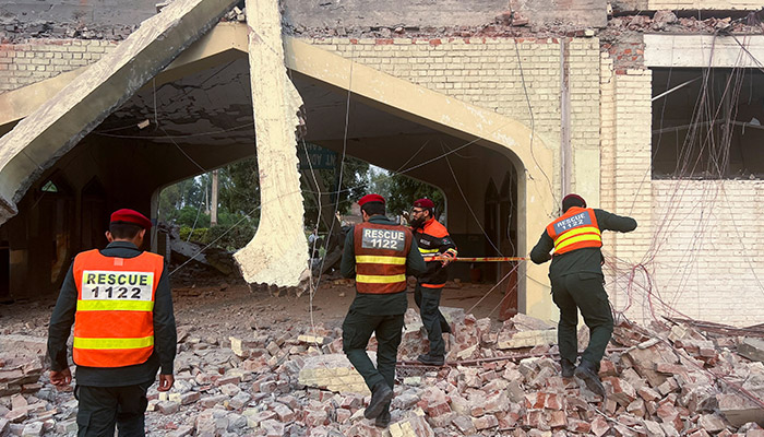 Rescue workers cordon off a structure at the administration block of the Government Health and Education complex, damaged after it was hit by an Indian strike, in Muridke near Lahore, on May 7, 2025. — Reuters