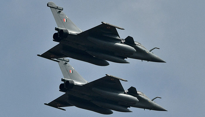 Indian Air Forces Rafale fighter jets fly past during the Aero India 2021 air show at Yelahanka air base in Bengaluru, India, February 3, 2021. — Reuters