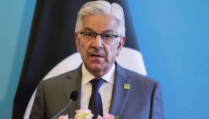 Defence Minister Khawaja Asif gestures during a political address. — APP/File