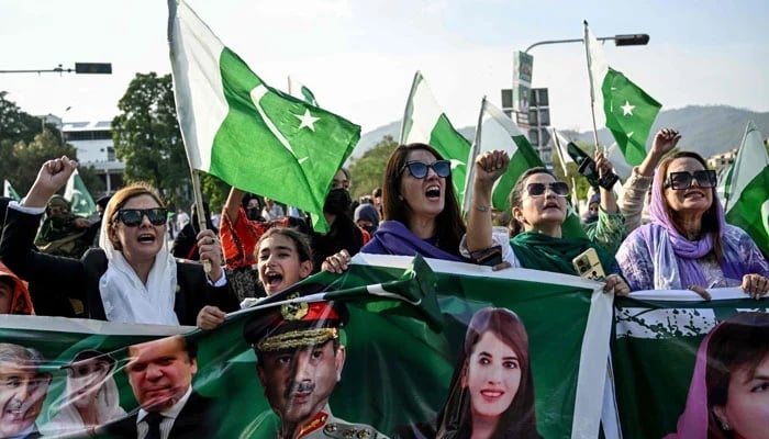 Pakistani women leading a demonstration where they are carrying the Pakistani flag after the ceasefire between Pakistan and India, in Islamabad, on May 10, 2025. — AFP