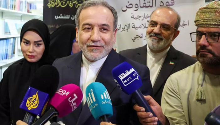 Irans Foreign Minister Abbas Araghchi speaks to the media during a book signing event in Muscat last month — AFP