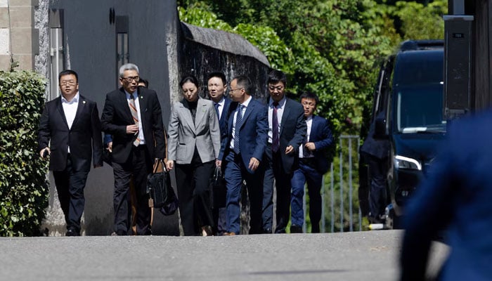 Members of the Chinese delegation leave a residence where trade talks between Chinese and US delegations take place in Geneva, Switzerland, May 10, 2025. — Reuters