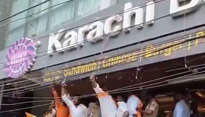 The screenshot shows extremists at a Karachi Bakery outlet in Hyderabad. — Indian media