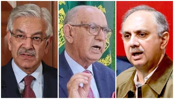 Defence Minister Khawaja Asif (left), PML-N Senator Irfan Siddiqui (centre), and Opposition Leader in the National Assembly Omar Ayub Khan. — AFP/APP/File