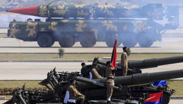 A Hatf-VI (Shaheen-II) missile (background) is displayed during the Pakistan Day parade in Islamabad on March 23, 2015. — Reuters