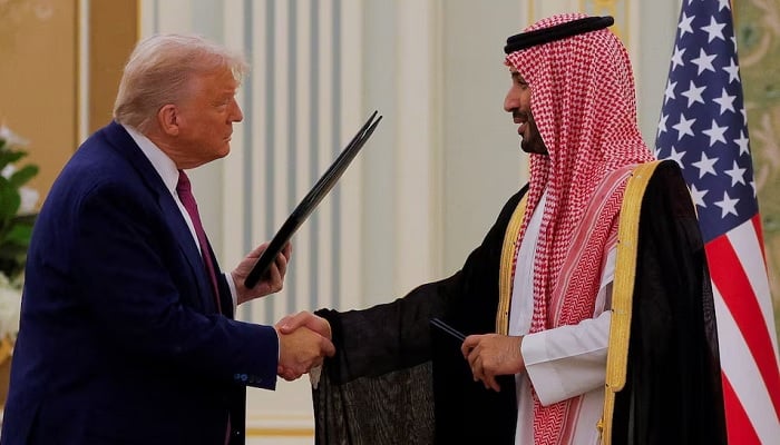 U.S. President Donald Trump and Saudi Crown Prince and Prime Minister Mohammed Bin Salman shake hands during a Memorandum of Understanding (MOU) signing ceremony at the Royal Court in Riyadh, Saudi Arabia, May 13, 2025. — Reuters