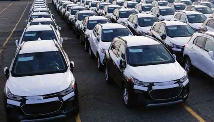 The image shows parked cars for sale. — Reuters/File