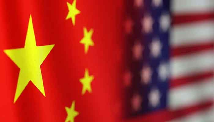 The image shows China and US flags. — Reuters/File