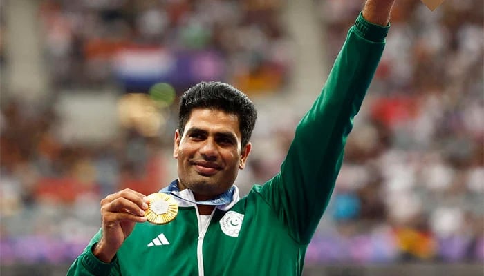 Gold medalist Arshad Nadeem of Pakistan celebrates with his medal on the podium at Mens Javelin Throw Victory Ceremony in the Stade de France, Saint-Denis, France on August 9, 2024. — Reuters