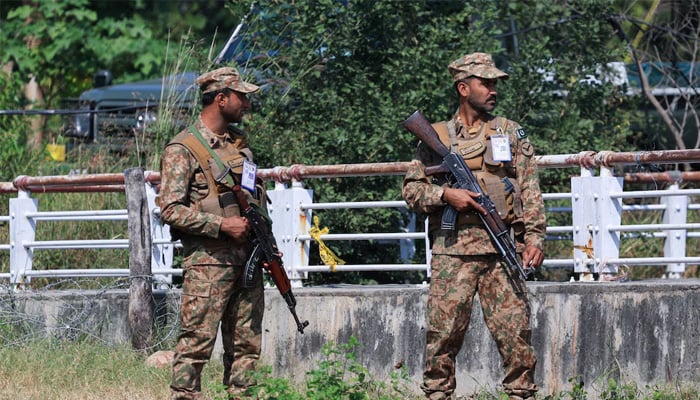 Pakistan Army soldiers stand guard at the Red Zone area in Islamabad on October 14, 2024. — Reuters