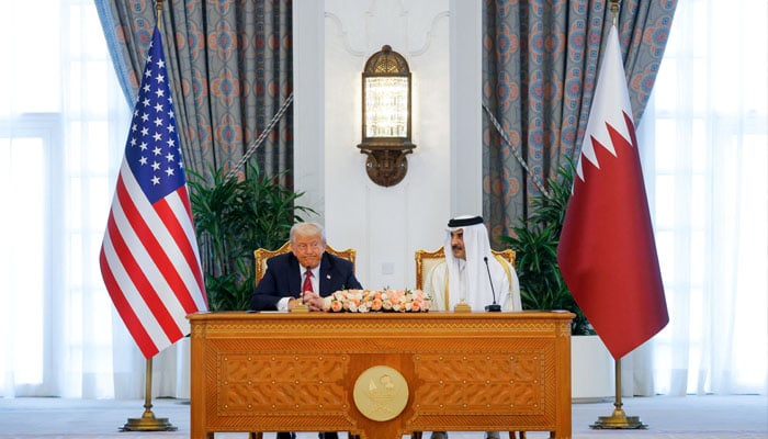 US President Donald Trump and Qatars Emir Tamim bin Hamad Al Thani attend a signing ceremony in Doha, Qatar, May 14, 2025 — Reuters