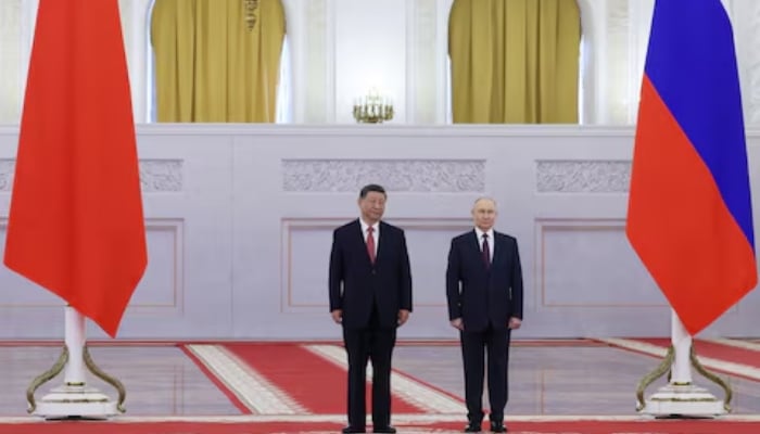(From left) Chinese President Xi Jinping and Russian President Vladimir Putin attend a welcoming ceremony before their talks at the Kremlin in Moscow, Russia, May 8, 2025. — Reuters