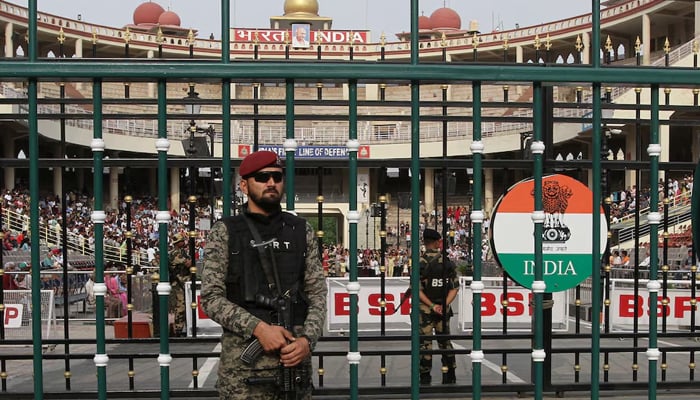 A Pakistan Ranger stands guard before the start of a parade at the Pakistan-India joint check post at Wagah border, near Lahore, on May 4, 2025. — Reuters