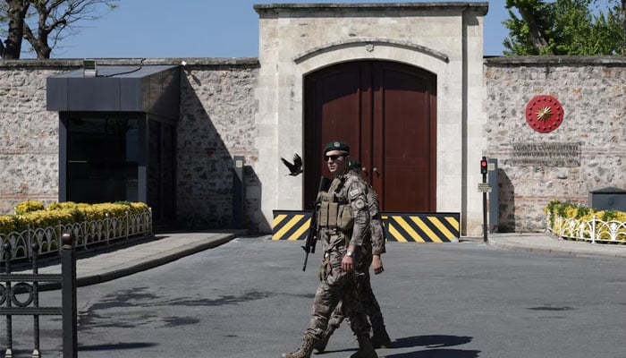 Members of Turkish polices special forces walk outside the Turkish Presidencys Dolmabahce working office, where Russia and Ukraine direct talks might happen, in Istanbul, Turkey, May 15, 2025 — Reuters