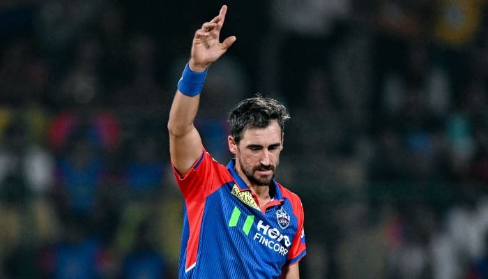 Delhi Capitals Mitchell Starc celebrates after taking a wicket during the Indian Premier League (IPL) Twenty20 cricket match between Delhi Capitals and Kolkata Knight Riders at the Arun Jaitley Stadium in New Delhi, India, on April 29, 2025. — AFP