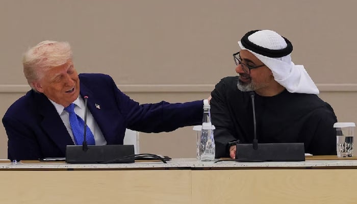 US President Donald Trump and Crown Prince of Abu Dhabi Sheikh Khaled bin Mohamed bin Zayed Al Nahyan react during roundtable discussion, at a business forum at Qasr Al Watan, during the final stop of his Gulf visit, in Abu Dhabi, United Arab Emirates, May 16, 2025.— Reuters