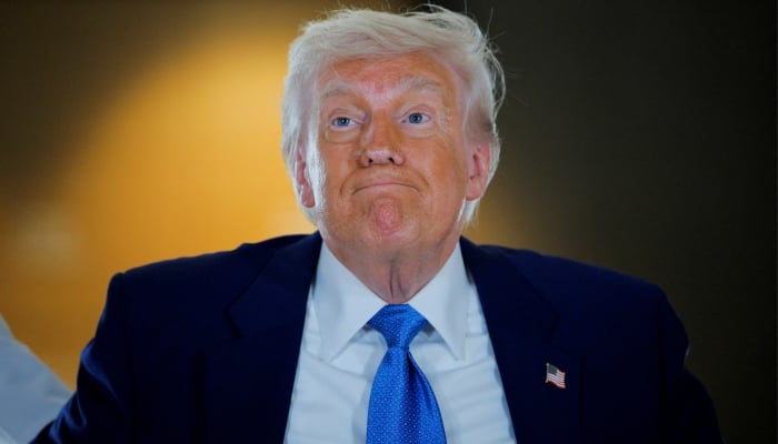 US President Donald Trump reacts as he visits the Abrahamic Family House during the final stop of his Gulf visit, in Abu Dhabi, United Arab Emirates, May 16, 2025. — Reuters