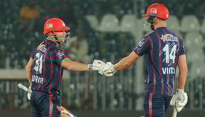 Karachi Kings skipper David Warner (left) and James Vince fist-bumping during the PSL 10 match against Peshawar Zalmi at Rawalpindi Cricket Stadium on May 17, 2025. — X/@thePSLt20