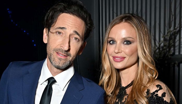 Adrien Brodys girlfriend Georgina Chapman says the viral Oscar gum toss moment was her idea