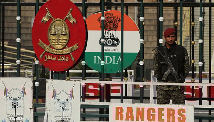 A Pakistan Ranger stands guard at the Pakistan-India joint check post at Wagah border, near Lahore on, May 14, 2025. — Reuters