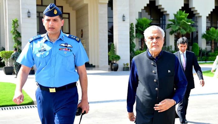 DPM Ishaq Dar is greeted by a PAF officer at the Nur Khan Air Base in rawalpindi before his departure on May 19, 2025. — X@ForeignOfficePK