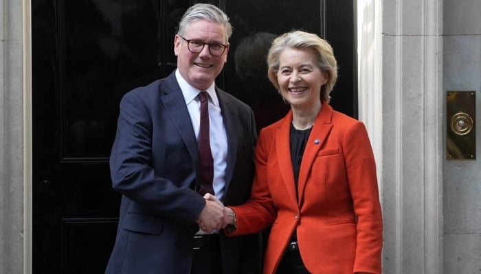 Britains Prime Minister Keir Starmer (L) greets European Commission President Ursula von der Leyen outside 10 Downing Street on April 24, 2025. — AFP