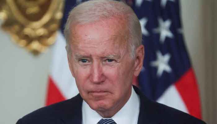 Former US President Joe Biden pauses as he speaks during a signing ceremony for The Inflation Reduction Act of 2022 in the State Dining Room of the White House in Washington, US August 16, 2022. — Reuters