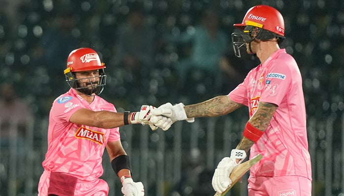 Islamabad Uniteds Sahibzada Farhan (left) and Alex Hales fist-bumping during the PSL 10 match against Karachi Kings at Rawalpindi Cricket Stadium on May 19, 2025. — PCB